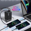 65W:n GaN-matkalaturi - sisäänvedettävä USB-C-kaapeli, USB-C-/USB-A-liitännät - musta