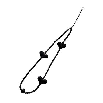 Akryylinen sydämenmuotoinen helmillä koristeltu puhelimen kaulanauha, 23.5cm - musta
