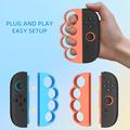 Näppäinkahvat Nintendo Switchin 2 Joy-Con-ohjaimelle – 2 kpl – oranssi / sininen