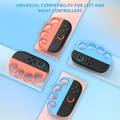 Näppäinkahvat Nintendo Switchin 2 Joy-Con-ohjaimelle – 2 kpl – oranssi / sininen