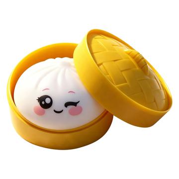 Dumpling squishy-lelu silmäilmeellä ja höyrytyskorilla - valkoinen