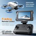 M6S taitettava drone, jossa on kaksi kameraa ja 4.3" näyttö kaukosäätimessä