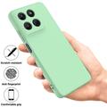 Motorola Moto G37/G37 Power/G47 Nestemäinen silikonikotelo käsihihnalla - Vihreä