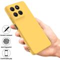 Motorola Moto G37/G37 Power/G47 Nestemäinen silikonikotelo käsihihnalla - Keltainen